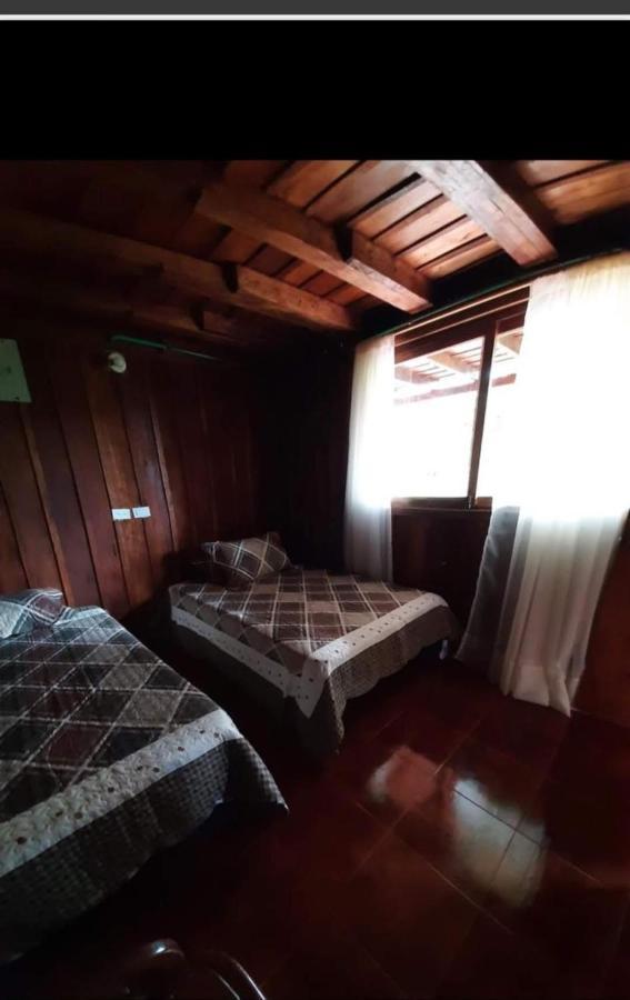 Hostal Y Cabanas Los Juanes Jardin Bagian luar foto