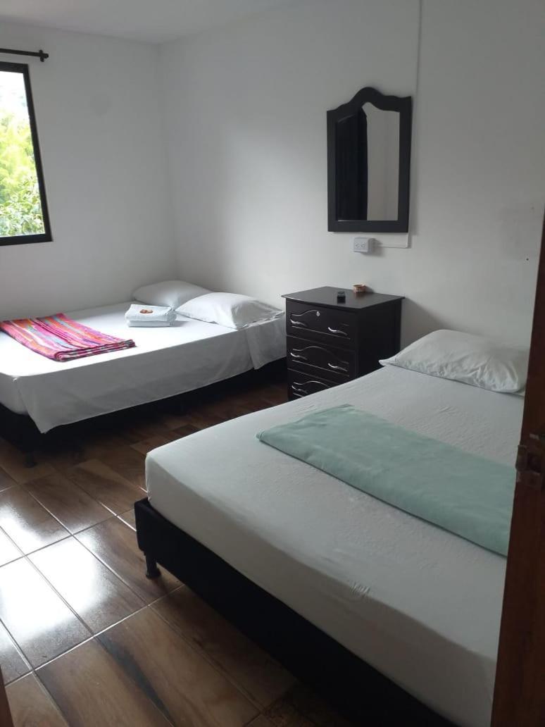 Hostal Y Cabanas Los Juanes Jardin Bagian luar foto