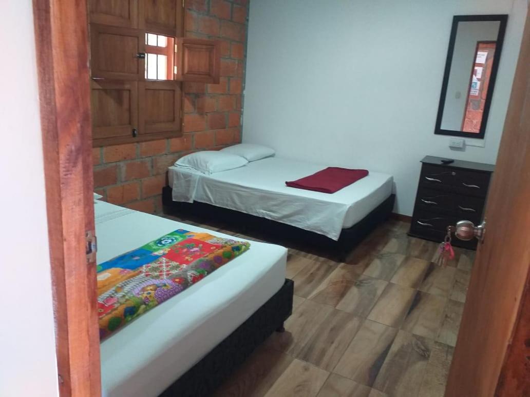 Hostal Y Cabanas Los Juanes Jardin Bagian luar foto